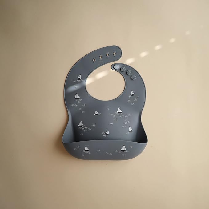 mushie Silicone Baby Bib | Adjustable Fit Waterproof Bibs (Boats)