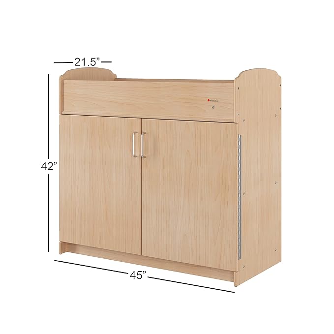 Foundations Serenity Daycare Changing Table with Storage Cubbies, Durable Wood Construction, Built-in Shelving for Ample Storage, Adjustable Safety Strap, Includes 1” Foam Mattress Pad (Natural)