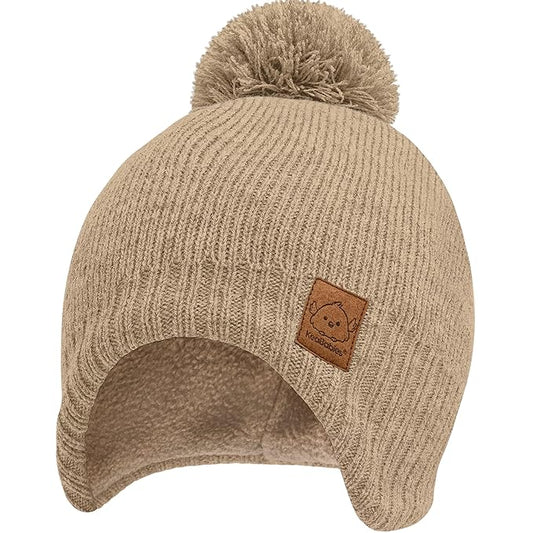 Baby Beanies, Baby Hats for Boys, Girls - Cute Toddler Winter Hat, Soft & Stretchy Beanies for Infant, Newborn 6-36 Months, Cozy & Warm with Earflap Muff & Pom (Taupe)